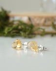 Raw citrine stud earrings on sterling silver posts shown at angle - handmade natural crystal jewelry by Designs by Nature Gems