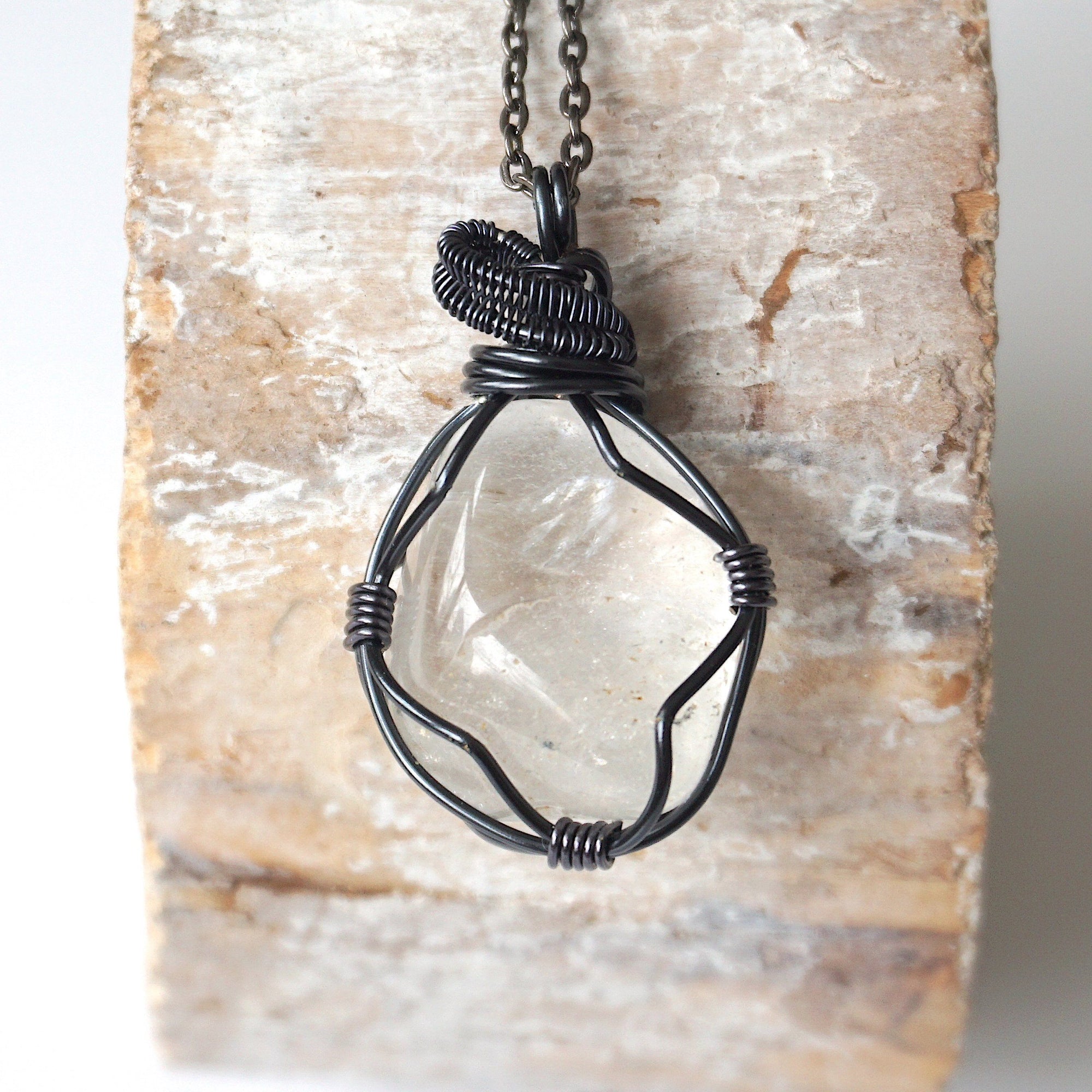Handcrafted clear quartz necklace for men on a gunmetal chain – artisan wire wrapped, April birthstone, natural crystal pendant.