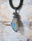 Handcrafted raw opal necklace for men, front view – artisan antiqued 925 sterling silver wire wrapping, October birthstone, black leather cord.