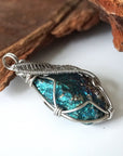 Right angle close-up of peacock ore pendant for women – showcasing artisan wire wrapped white gold copper, natural bornite crystal.