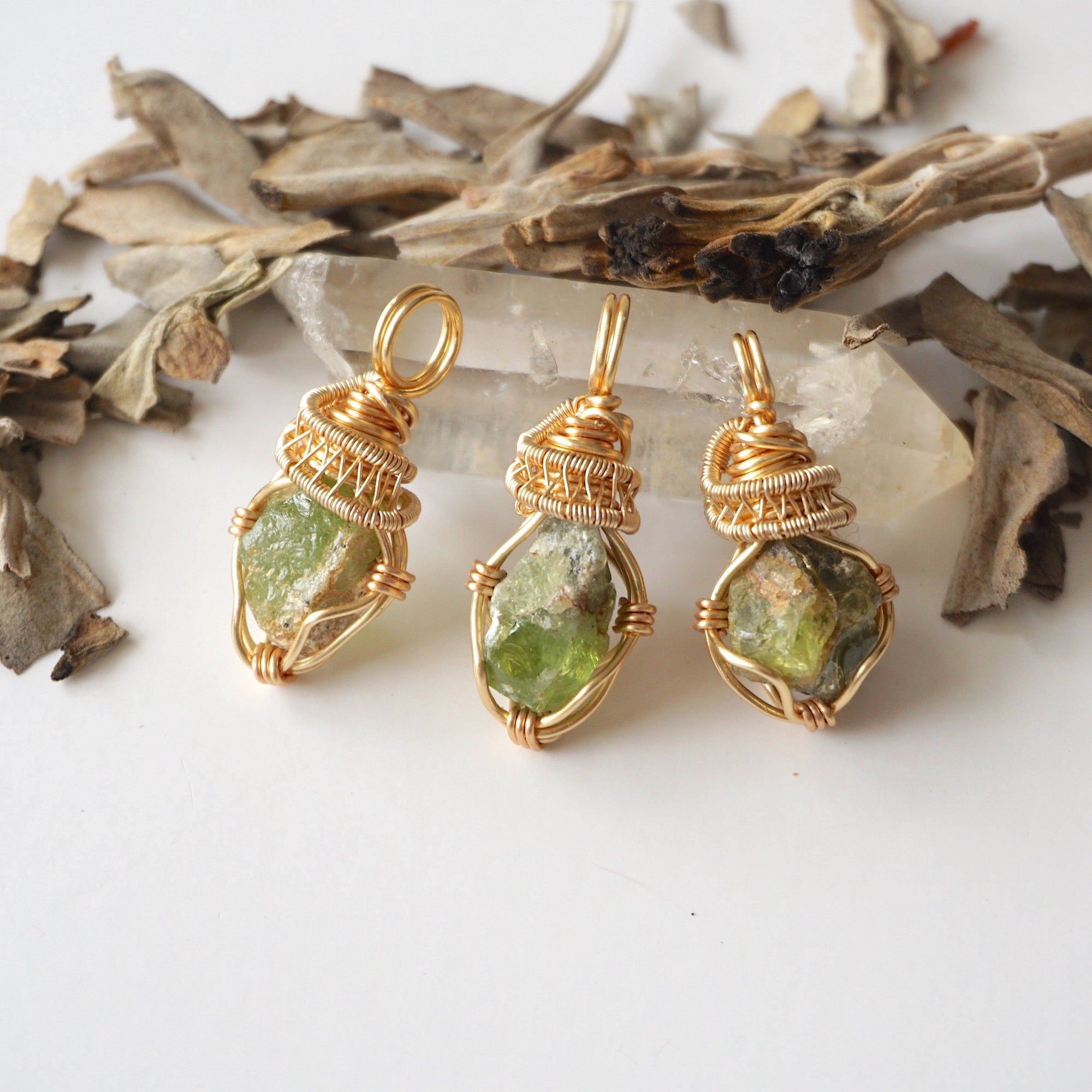 Three raw peridot necklaces for women – shows natural variation in size, shape, and green color of peridot stones.