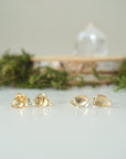 Two pairs of raw citrine stud earrings showing natural stone variation and size options - handmade crystal jewelry
