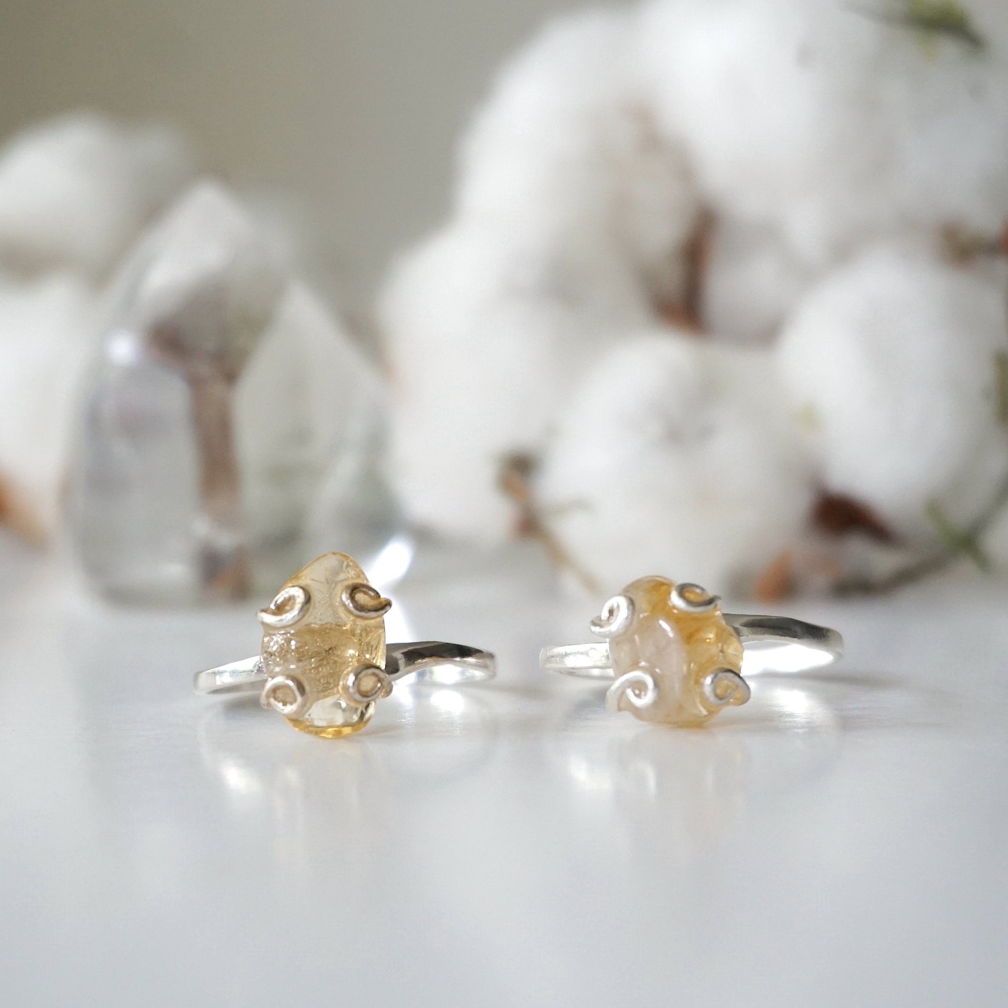 Two adjustable citrine rings sterling silver 925 showing natural variation - different crystal colors sizes shapes wire wrapped handmade unique one of a kind