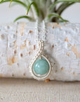 Detailed front view of aquamarine necklace for women, artisan wire wrapped in soft silver finish, Designs by Nature Gems