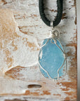 Back view of raw aquamarine pendant, genuine stone with handcrafted sterling silver wire, men's necklace