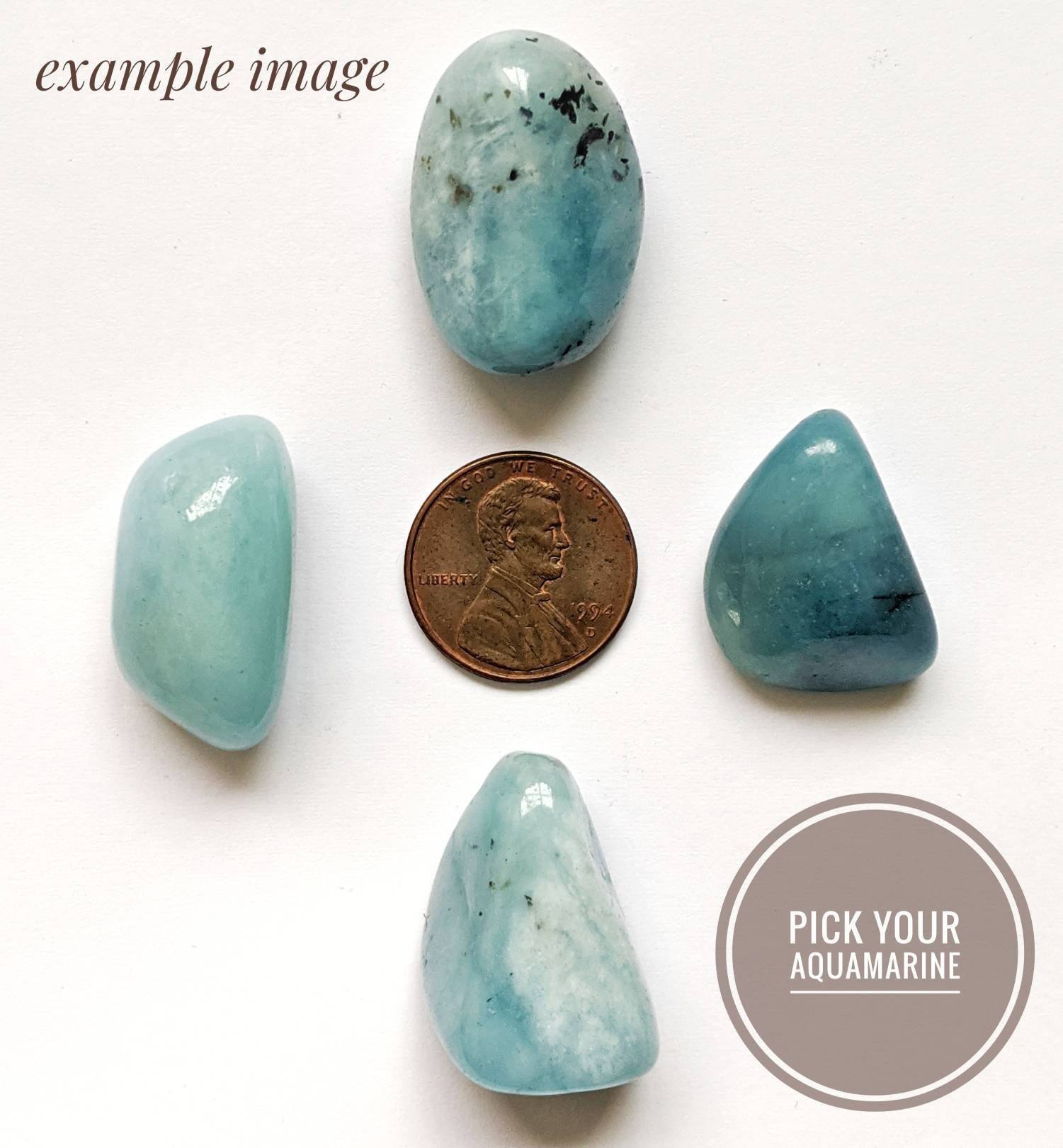 Four natural aquamarine stones showing variation in size, shape, and color for an aquamarine pendant necklace