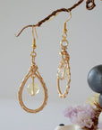 Close up wire detail of natural citrine crystal earrings- handmade drop earrings showing artisan craftsmanship and golden stone