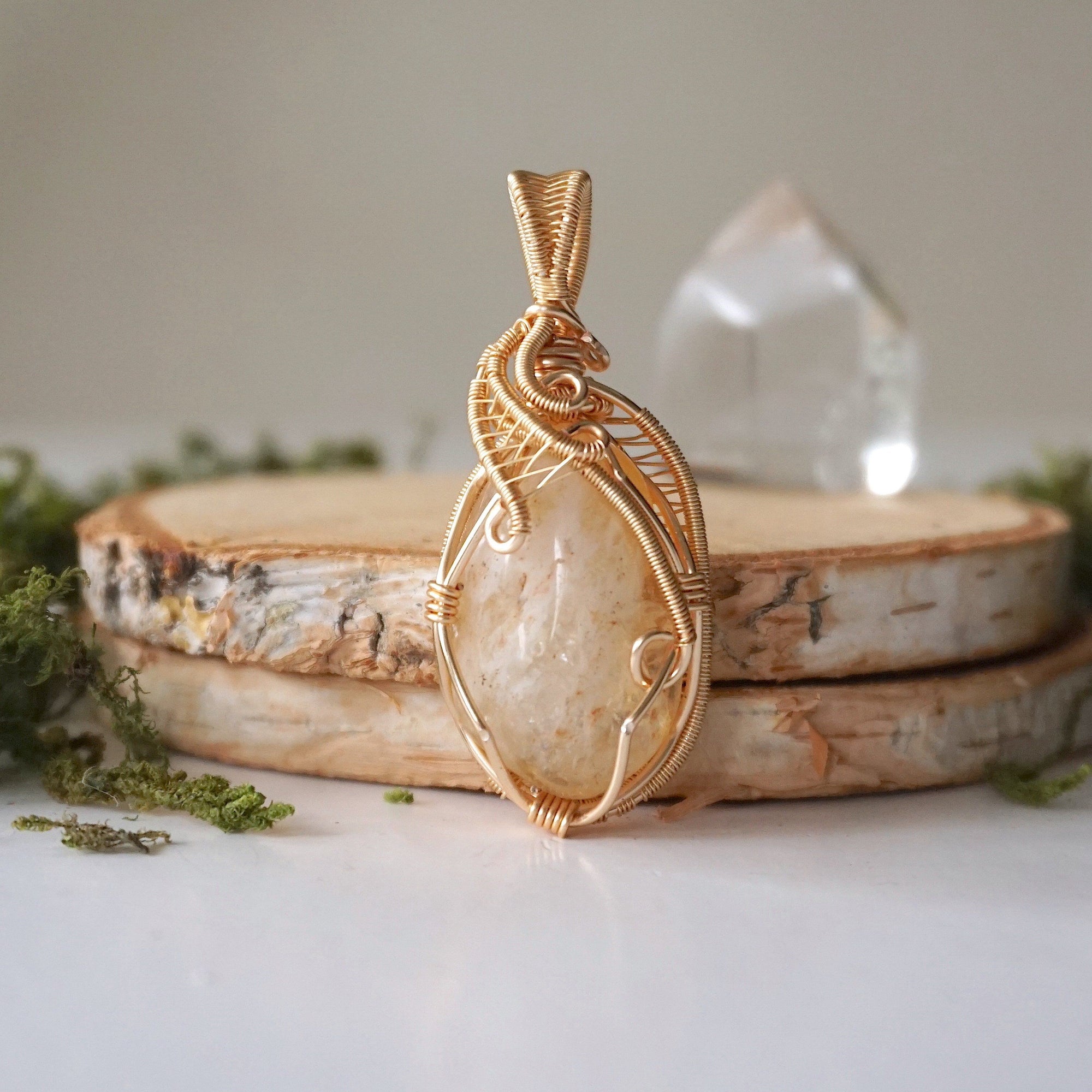 Back view of citrine pendant gold wire wrapped showing artisan craftsmanship November birthstone necklace detail
