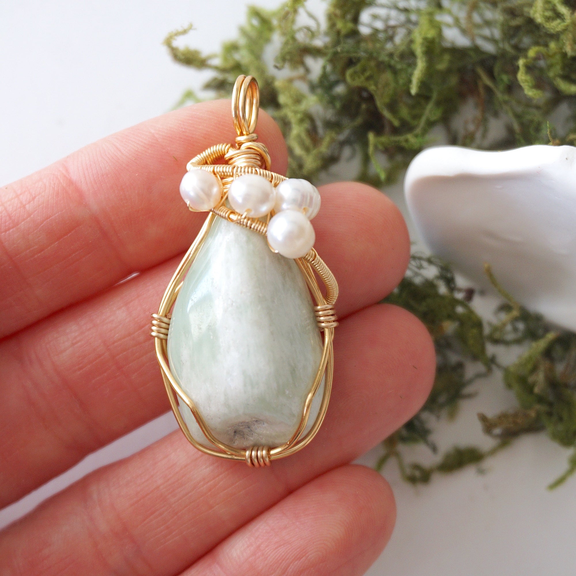Jade and freshwater pearl necklace pendant in hand for size reference, artisan birthstone jewelry gift for her