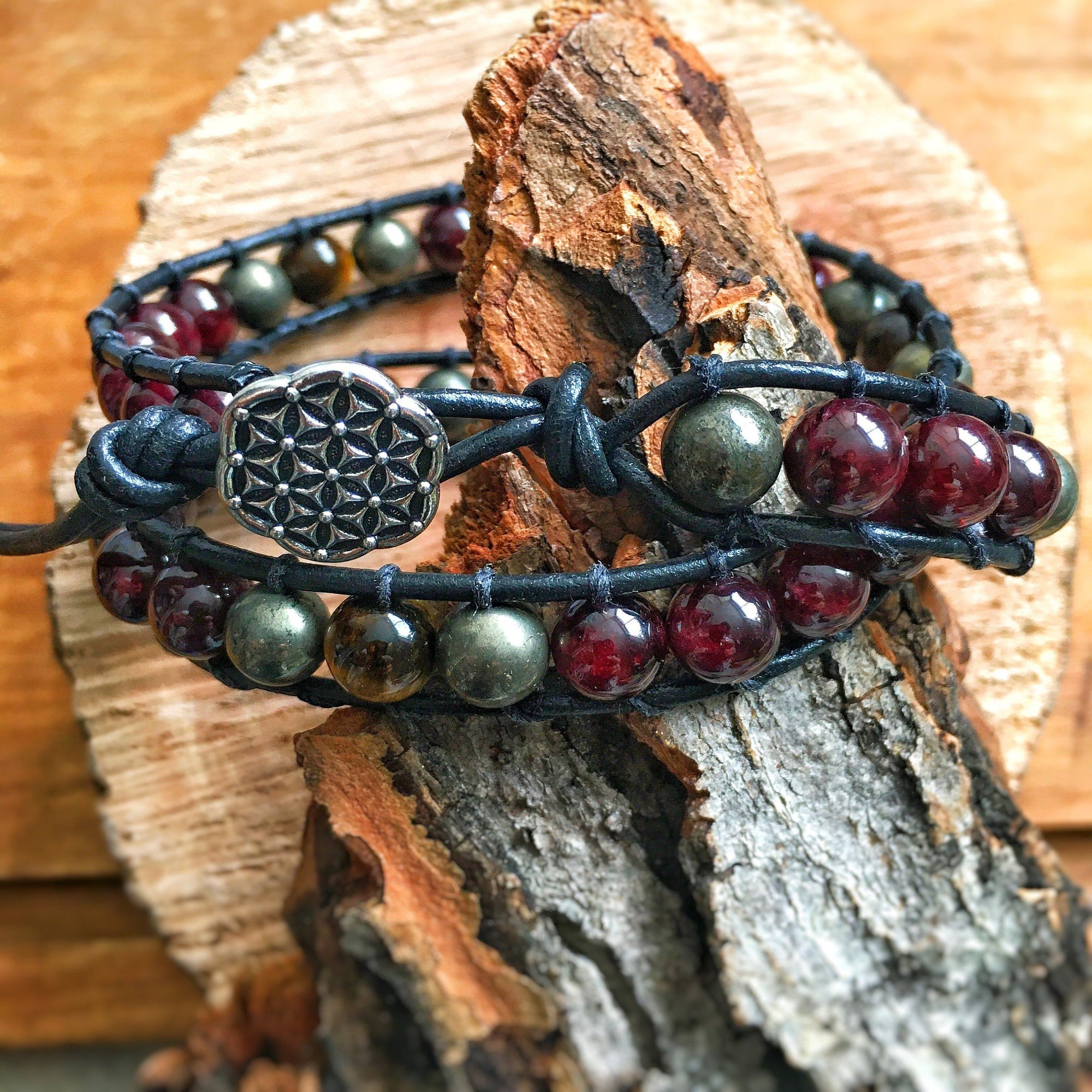 Men’s double wrap leather beaded bracelet with garnet, tiger’s eye, and pyrite, shown from an alternate angle