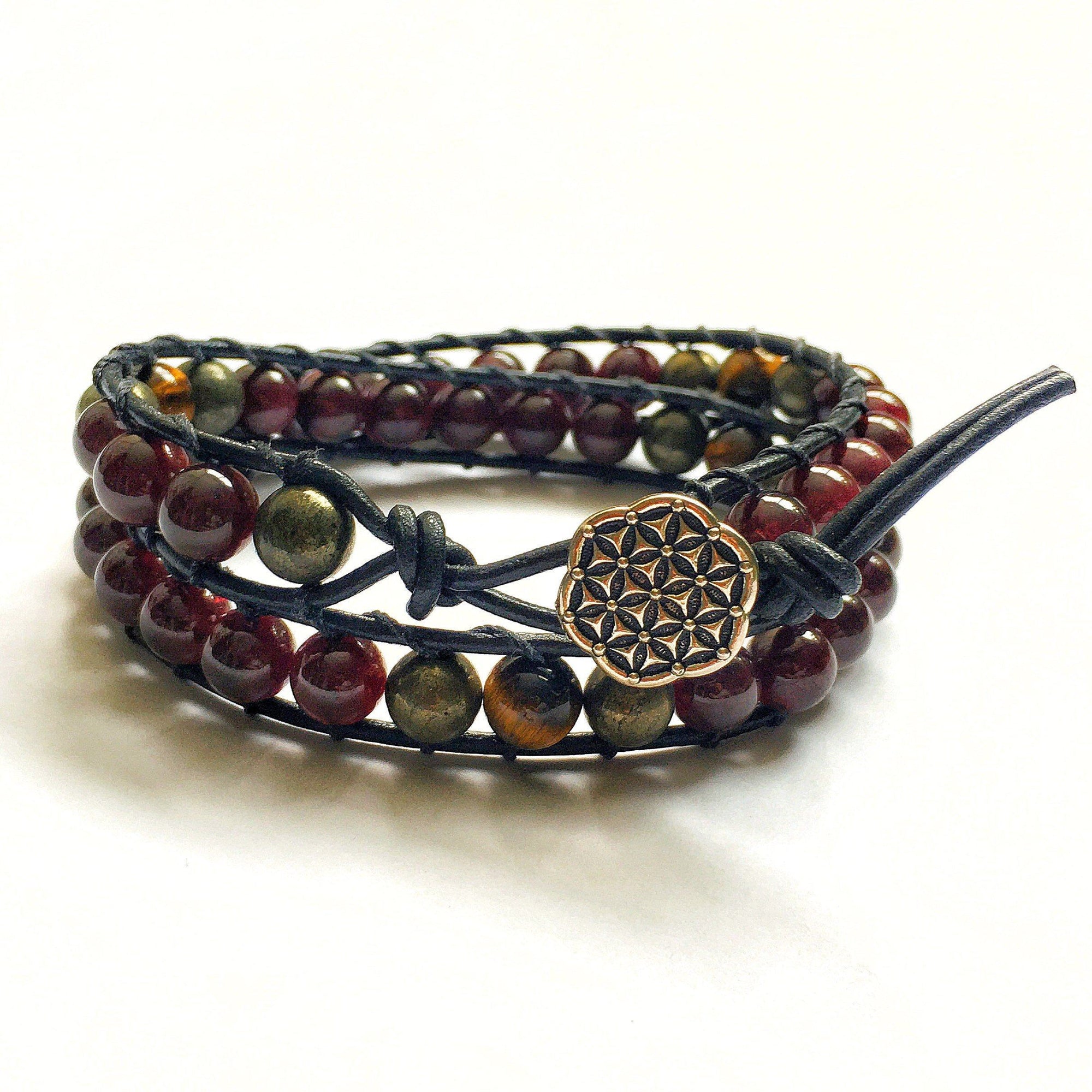 Men’s leather wrap beaded bracelet featuring garnet, tiger’s eye, and pyrite gemstones, shown from the front