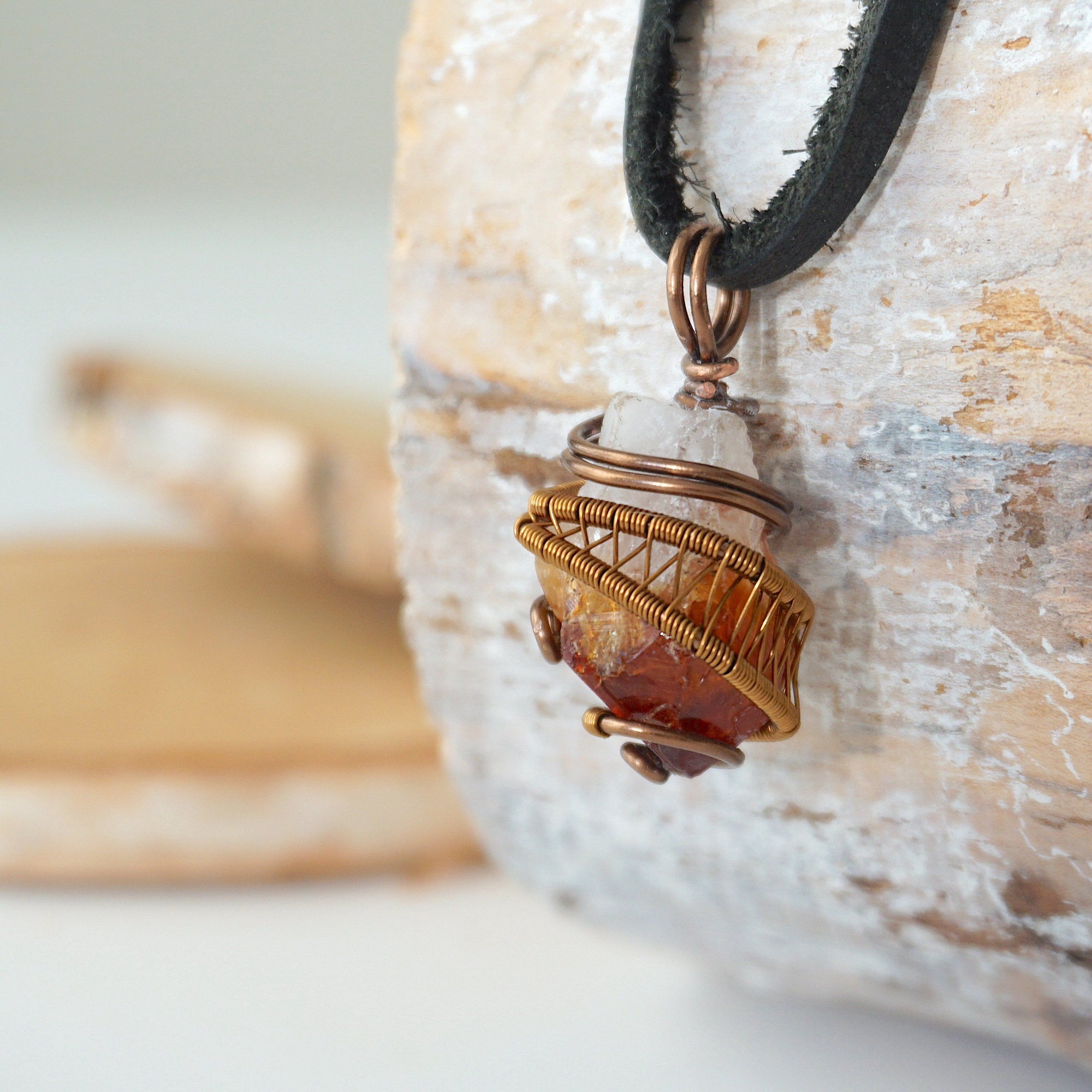 Side angle of mens raw citrine pendant showing crystal dimension and wire wrapping - natural unpolished stone in antique bronze copper handmade masculine necklace profile