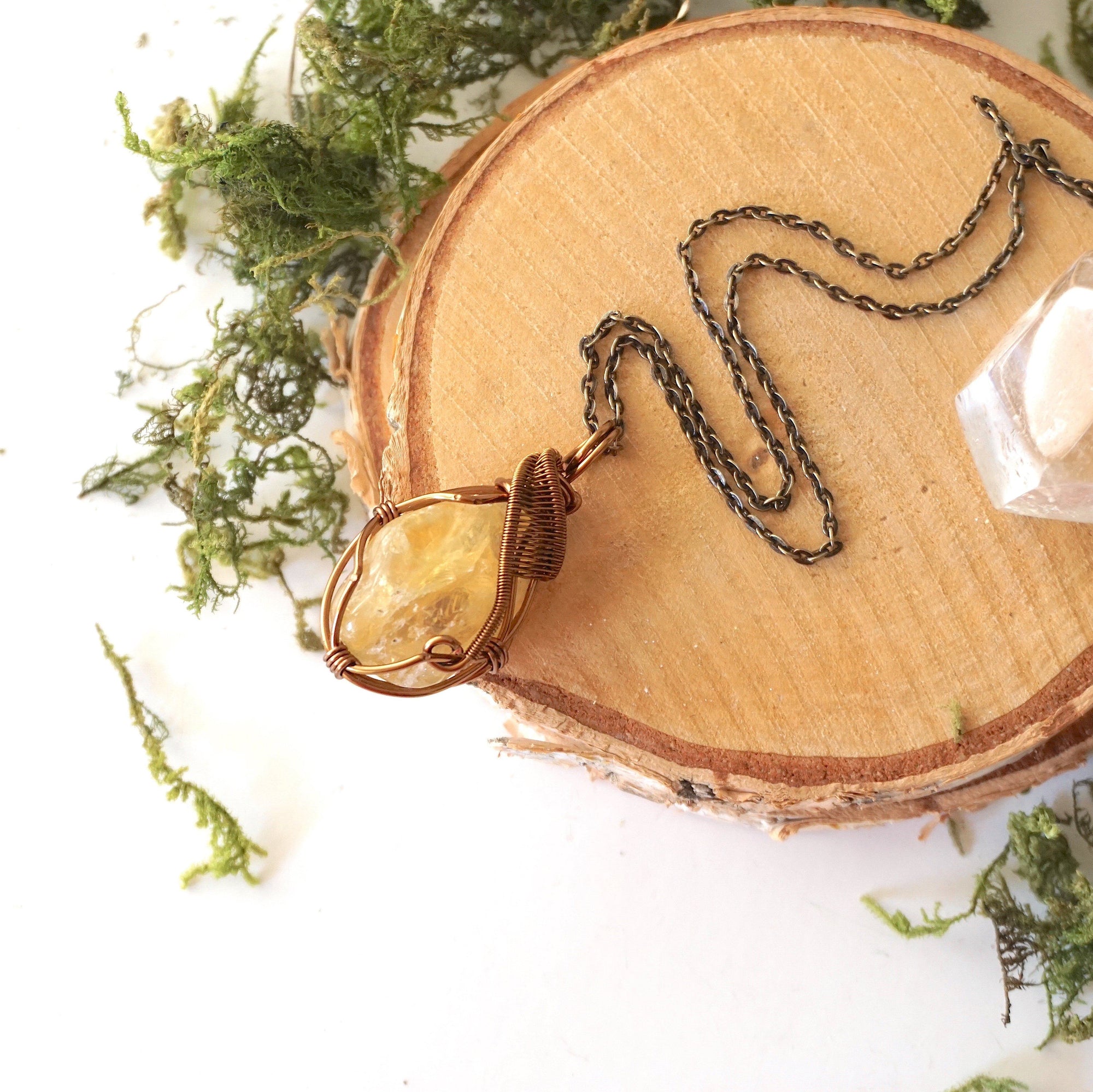 Natural citrine necklace laying flat on antique bronze copper chain - handmade wire wrapped crystal pendant full view vintage boho jewelry for women November birthstone