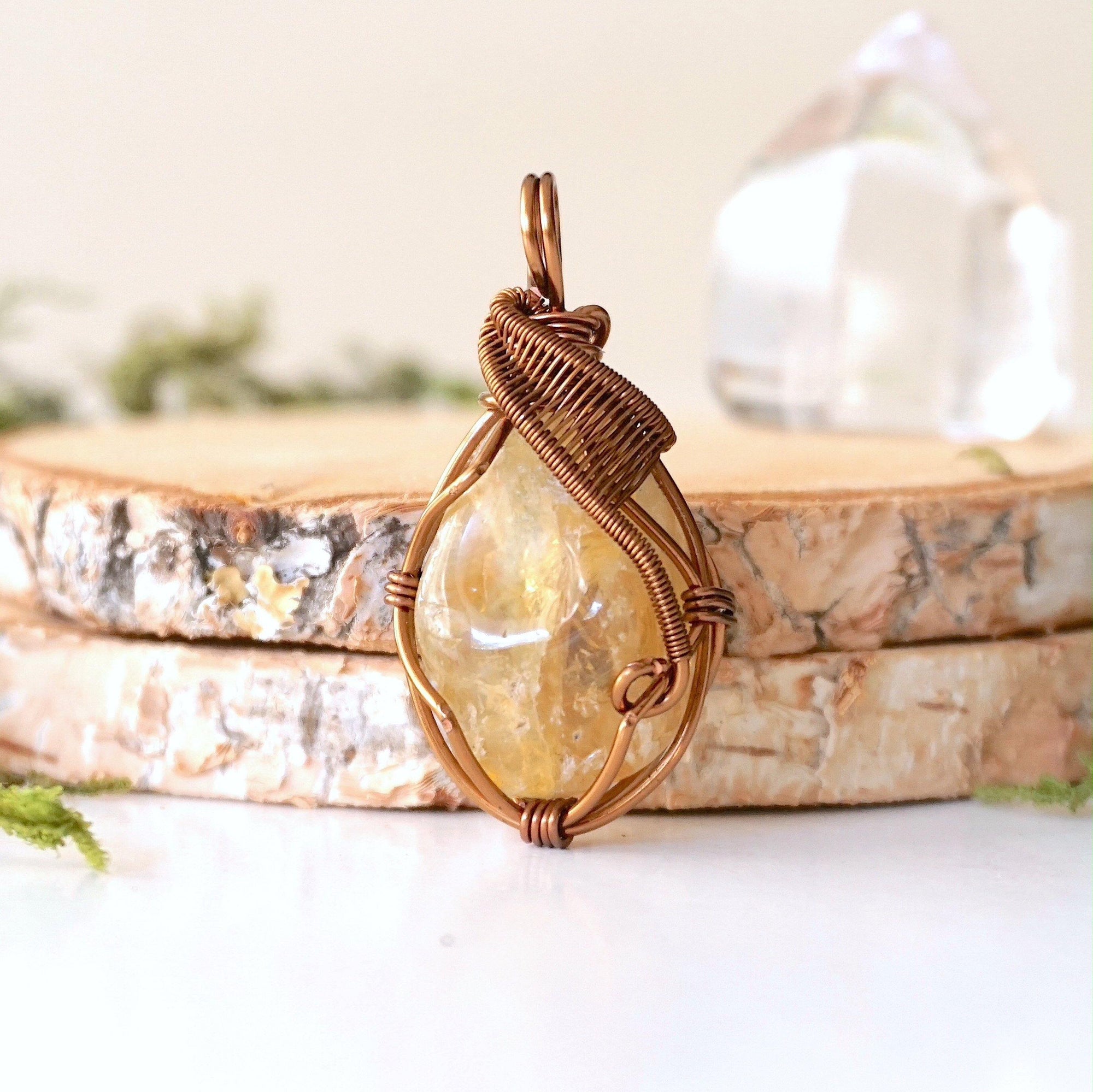 Front view of natural citrine pendant showing crystal texture and wire wrapping - antique bronze copper handmade November birthstone necklace detail vintage boho