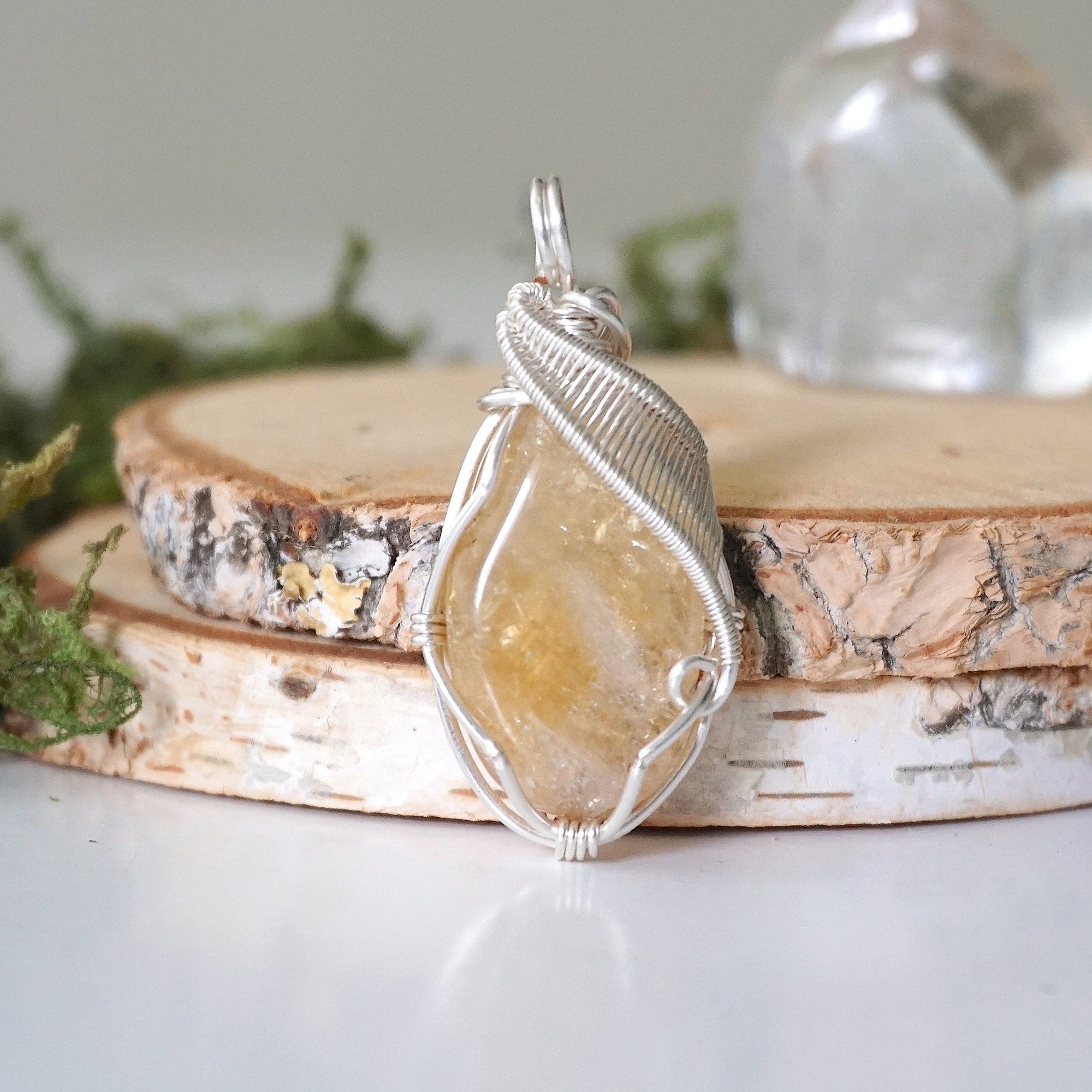 Front view of natural citrine pendant showing crystal texture and wire wrapping - silver plated copper handmade November birthstone necklace detail minimalist