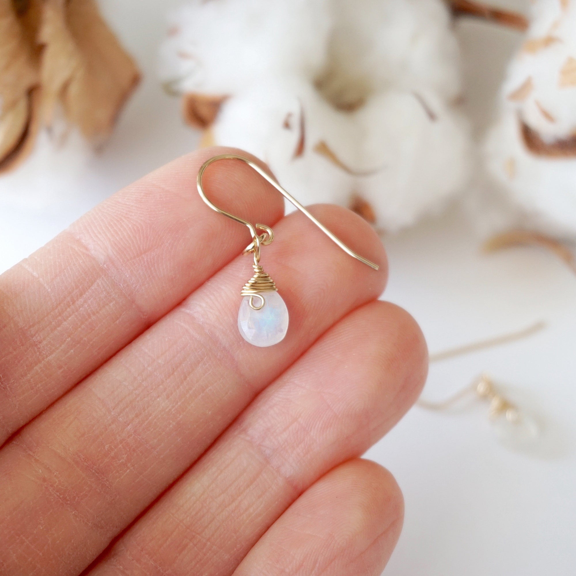 Rainbow moonstone drop earrings in hand for size reference, genuine faceted rainbow moonstone, 14k gold filled
