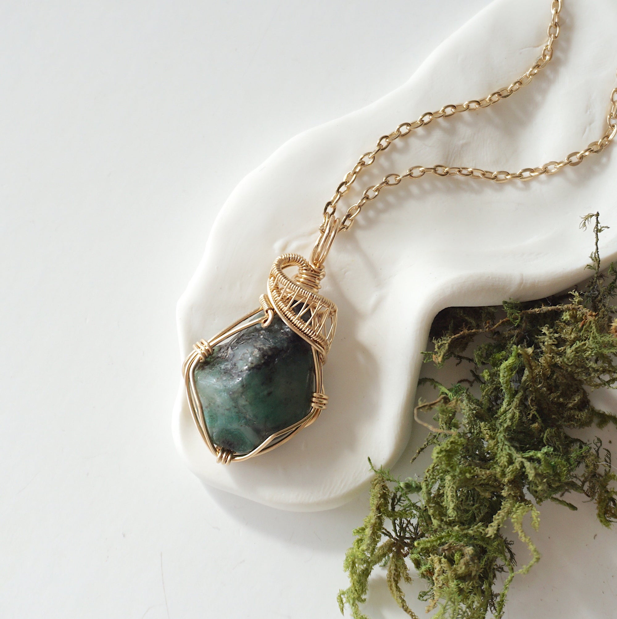Raw emerald necklace in 14k gold-filled wire by Designs by Nature Gems, handcrafted May birthstone pendant for women.