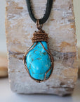Raw turquoise necklace for men with antique bronze copper wire wrap on leather