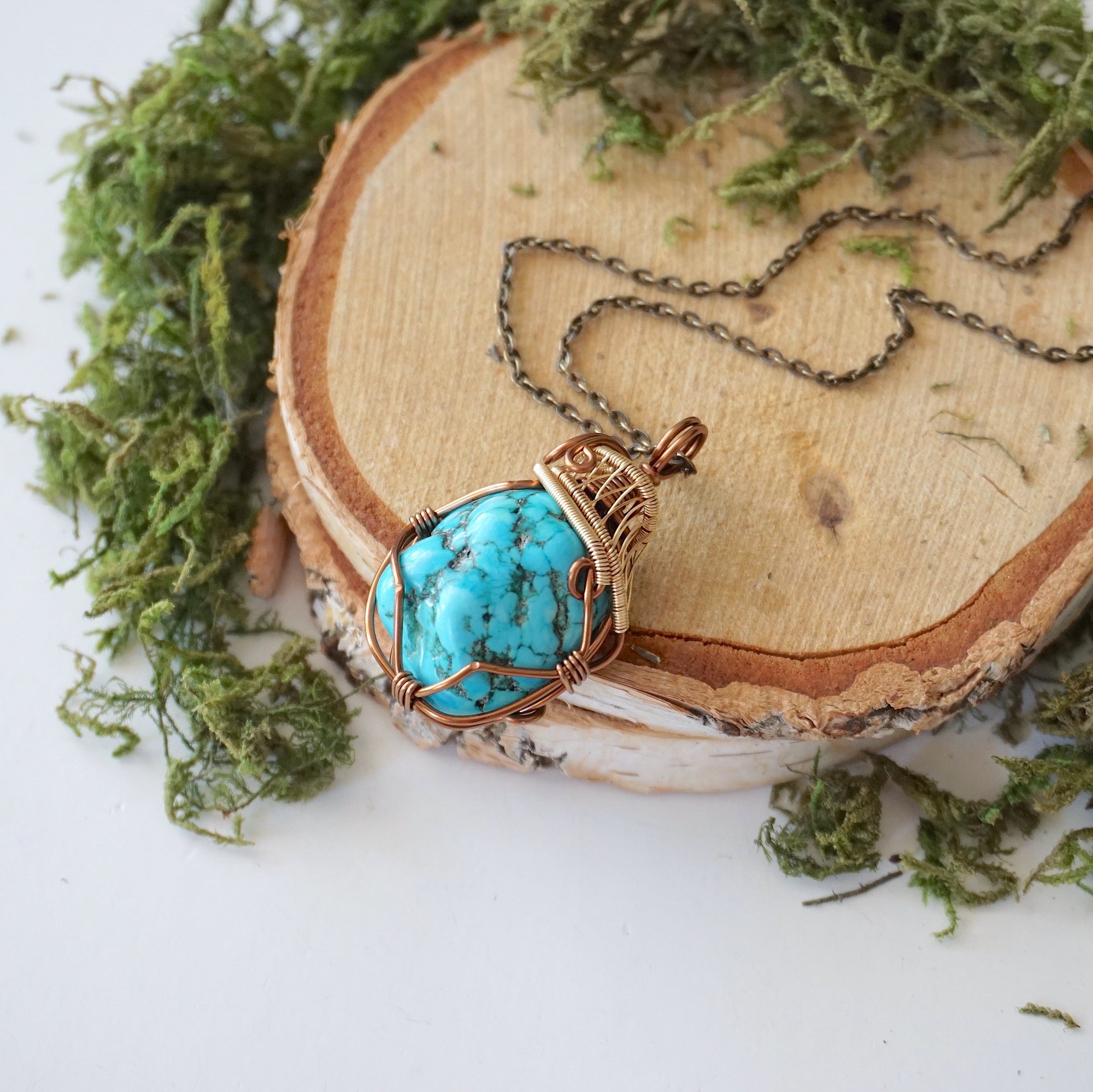 Raw turquoise necklace with bronze gold wire wrap on antique bronze chain