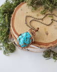 Raw turquoise necklace with bronze gold wire wrap on antique bronze chain