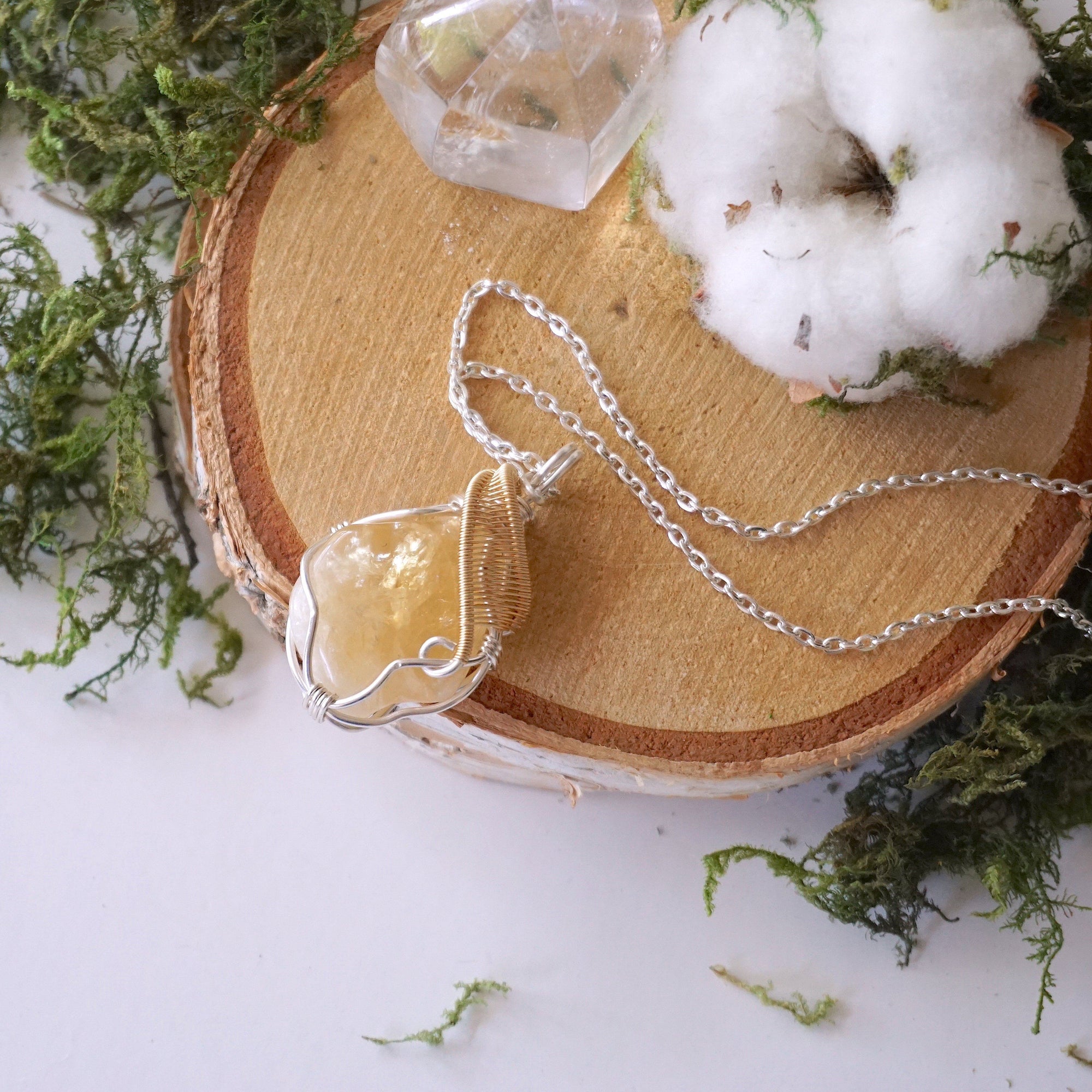 Silver and gold plated chain detail for citrine crystal necklace - mixed metal wire wrapped pendant jewelry chain closeup
