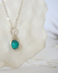 Right side angle of silver plated turquoise necklace showing stone depth detail