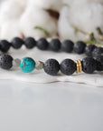 Turquoise lava bead mala bracelet close up showing natural stone and pyrite