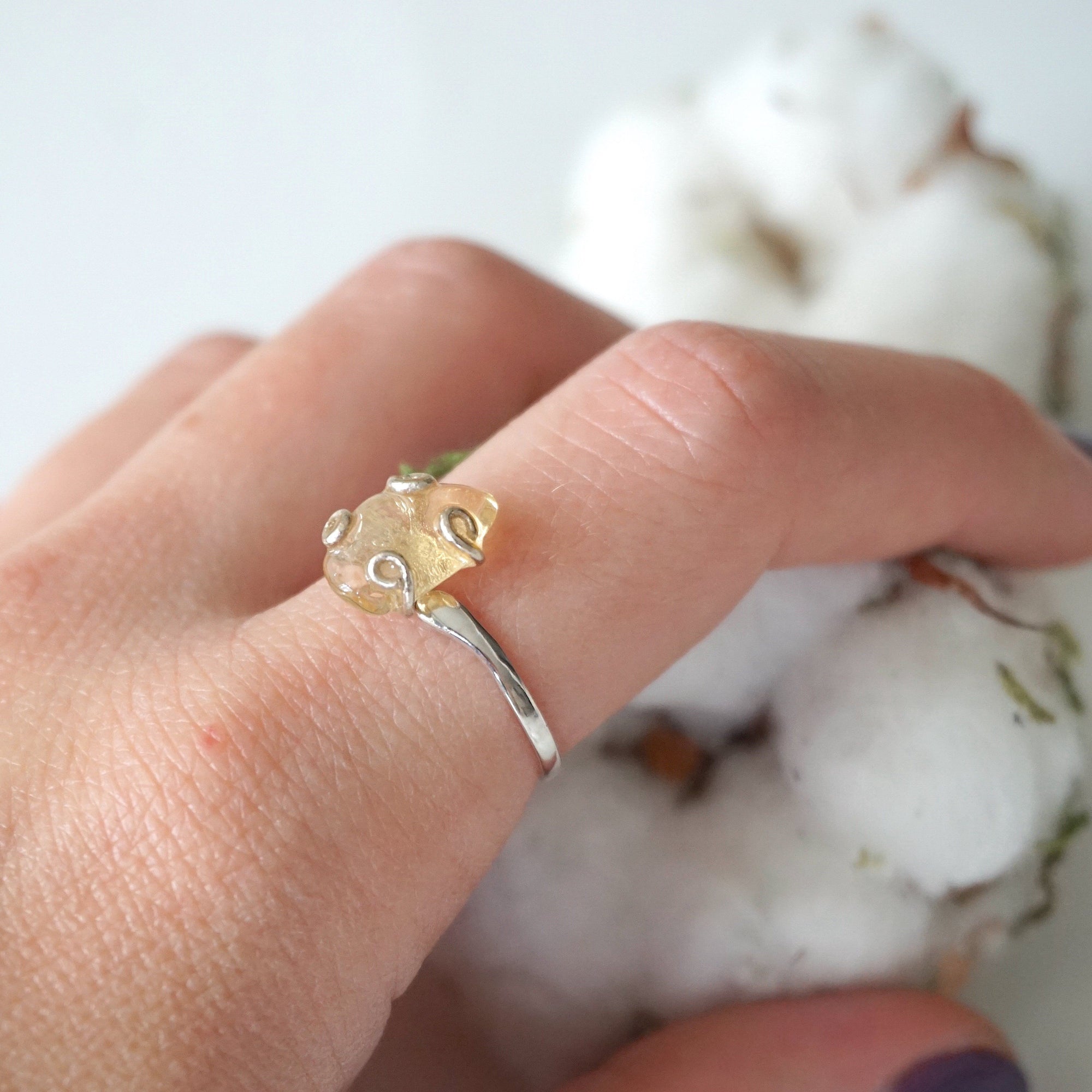 Woman wearing adjustable citrine ring sterling silver 925 on finger - natural crystal wire wrapped handmade ring November birthstone styled on hand